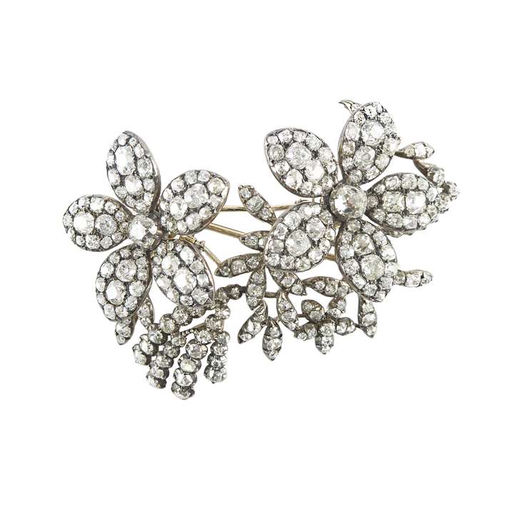 Early 19th century diamond floral and foliate tremblant spray brooch c.1810, with two principal five-petal flowerheads,